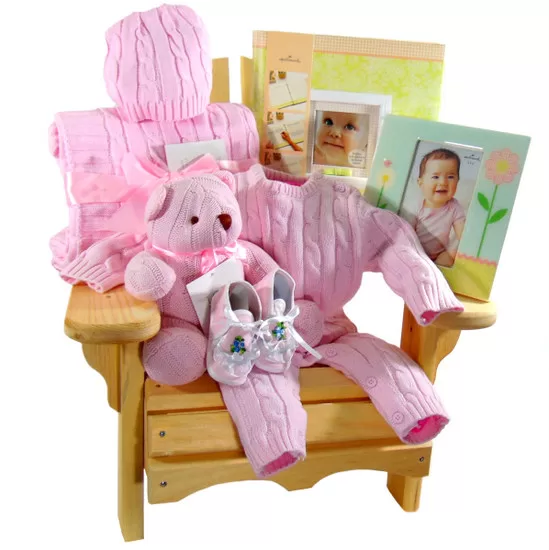 Baby Muskoka chair girl gift basket with newborn essentiales.